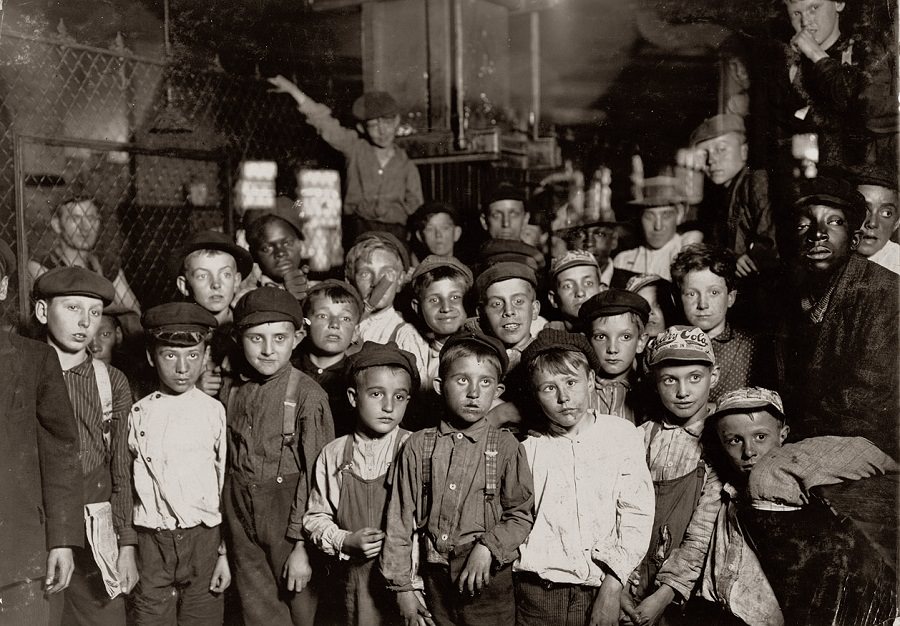 Indianapolis newsboys waiting for the Base Ball edition, in a newspaper office. August 1908