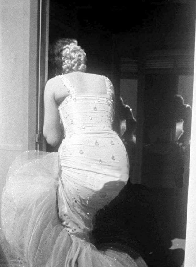 Marilyn Monroe Taking A Cigarette Break During The Filming Of “There’s No Business Like Show Business” 1954