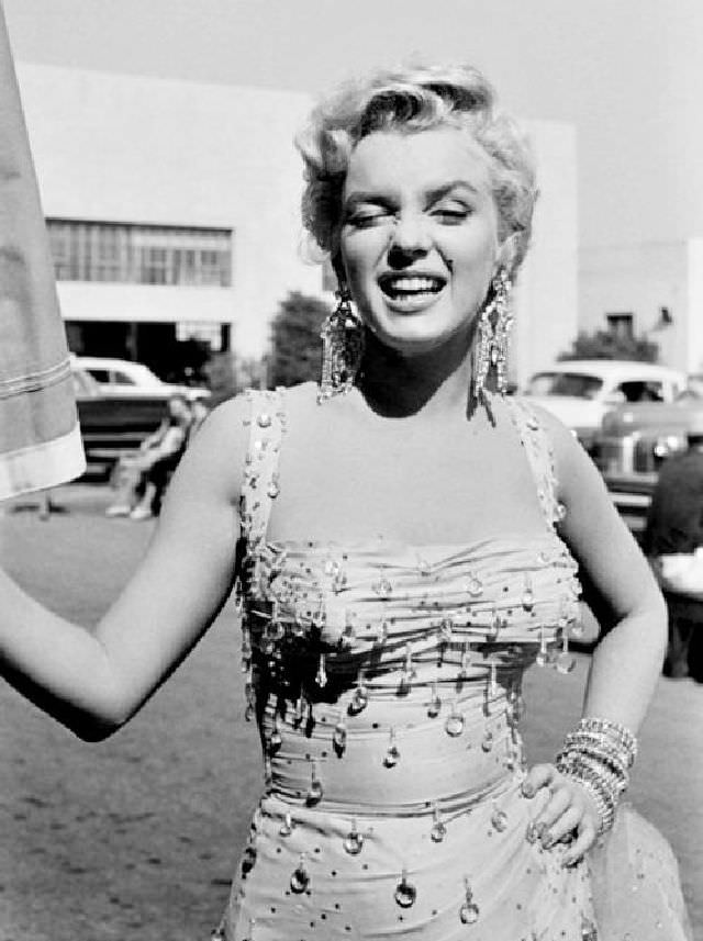 Marilyn Monroe Taking A Cigarette Break During The Filming Of “There’s No Business Like Show Business” 1954