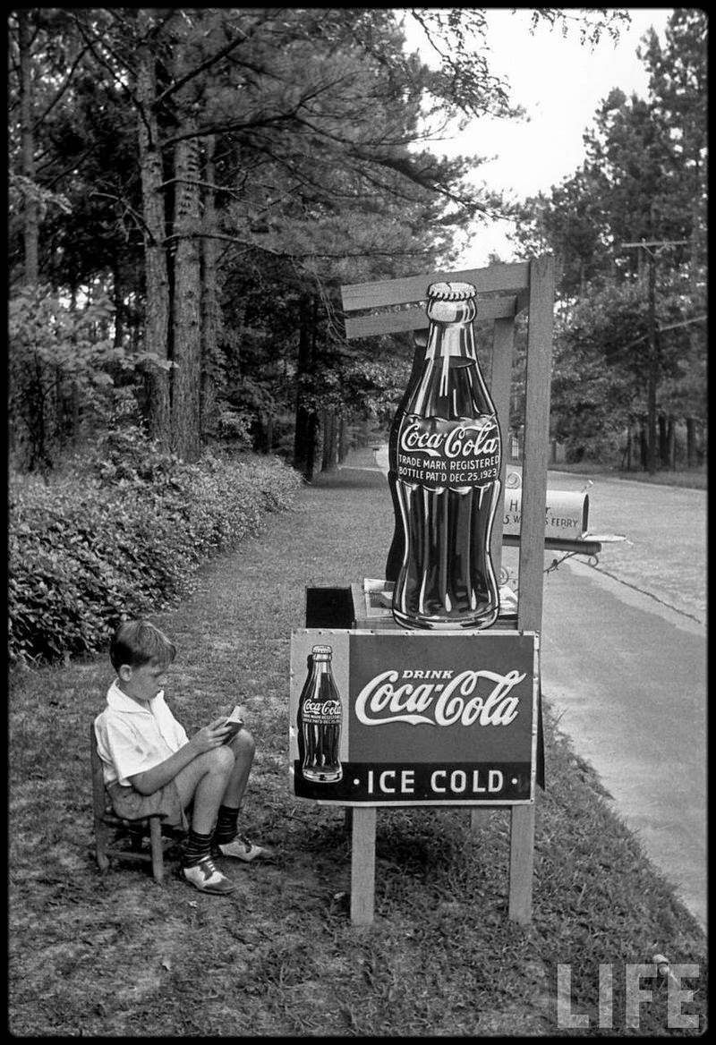 Little boy selling Coca-Cola, Atlanta, 1936