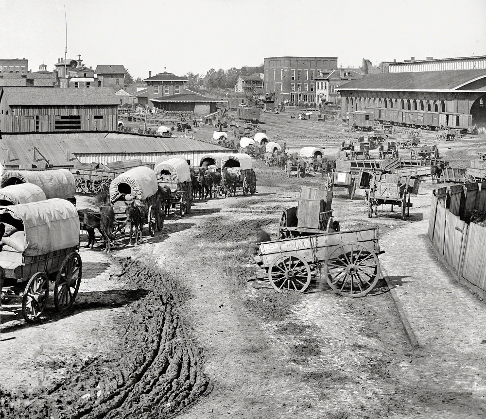 Federal Army wagons at railroad depot, 1864