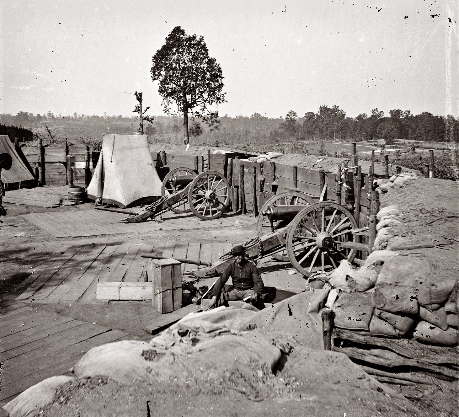 Union Army soldier at Confederate fortifications outside of Atlanta, 1864