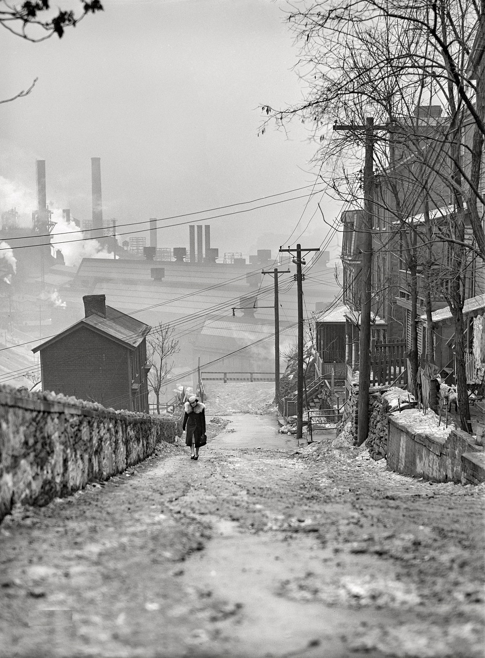 Street in the mill district in Pittsburgh, Pennsylvania, January 1941