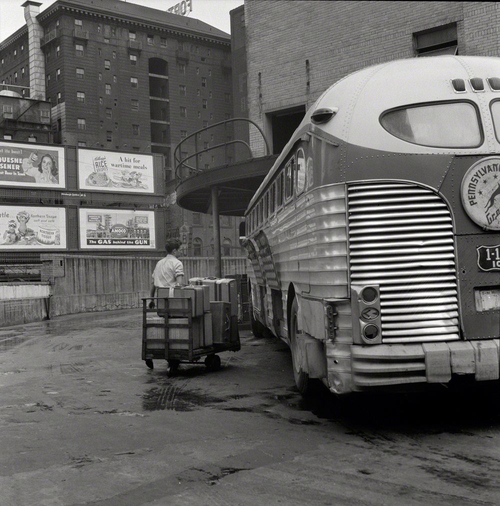 Bringing baggage from a bus, Pittsburgh, September 1943