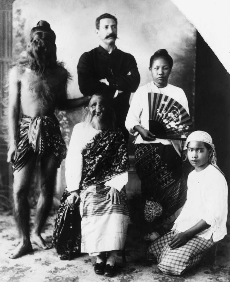 A Burmese family, two of whose members have faces covered in hair, are just one of the attractions advertised by American showman and circus owner P.T. Barnum. 1890
