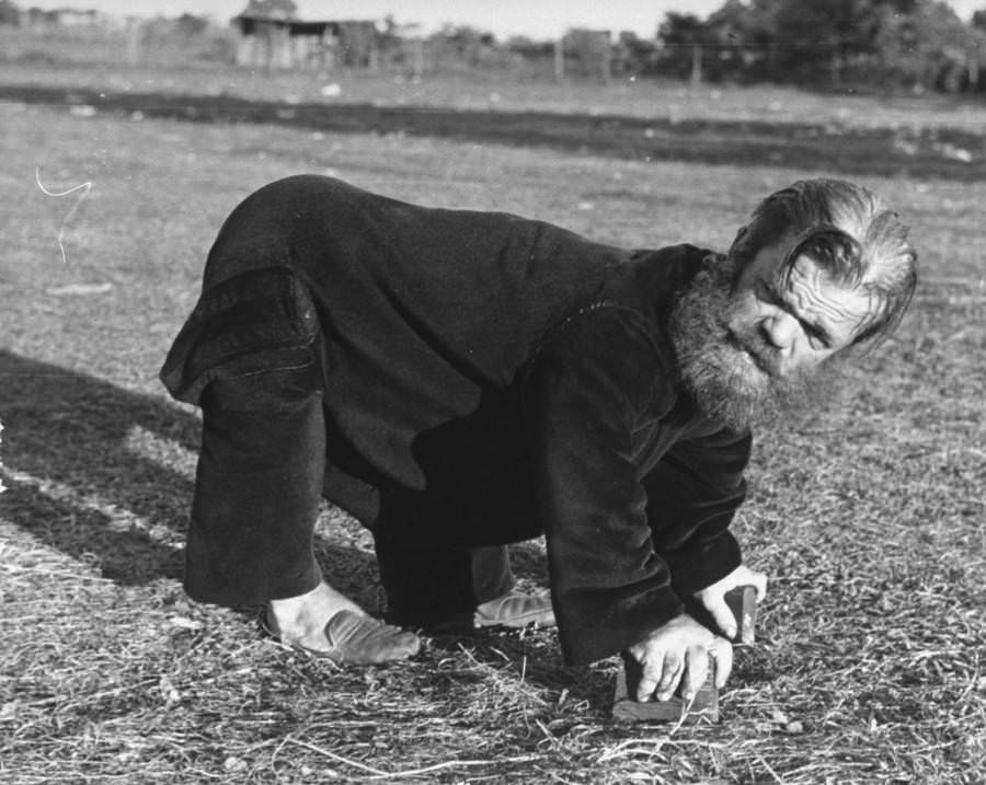 Bear Man" the bearded dwarf walking on all fours at the Greenbrier Valley Fair, 1938