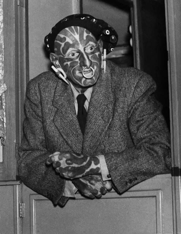 English freak and sideshow performer Horace Ridler in 1946. Extensively tattooed, he exhibited himself as "The Great Omi" or "The Zebra Man."