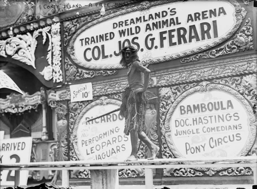 A sideshow performer brings in the crowd to Coney Island's Dreamland Trained Wild Animal Arena for a show in New York, New York. Early 1910s