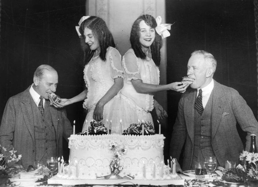 Daisy and Violet Hilton, a pair of British Siamese Twins who toured the US sideshow in the 1930's, celebrating their 17th birthday