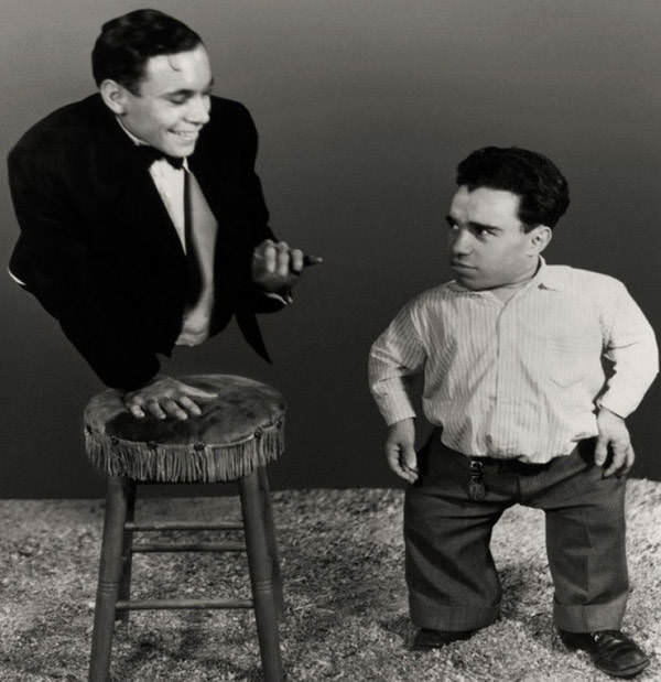 Born without the lower half of his torso, Johnny Eck is seen here with Angelo Rossitto in the film Freaks, 1932