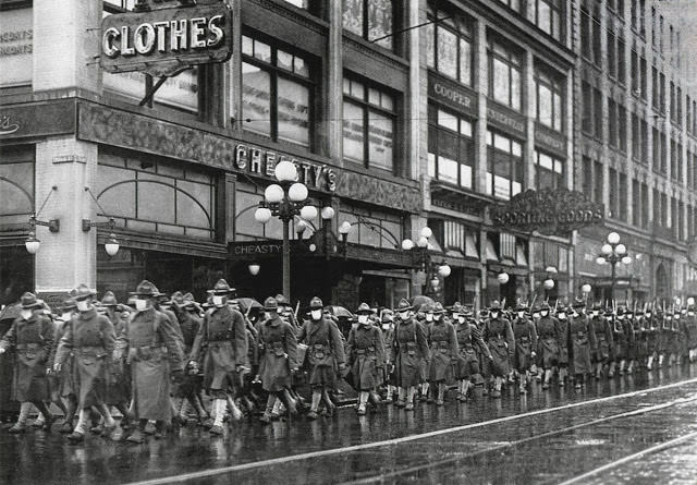 The U.S. Army 39th regiment wear masks to prevent influenza in Seattle in December of 1918. The soldiers are on their way to France.