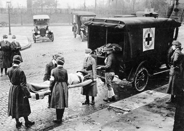 Red Cross Motor Corps members on duty during the influenza epidemic in the United States, in St. Louis, Missouri, in October of 1918.