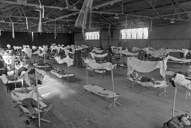 Convalescing influenza patients, isolated due to an overcrowded hospital, stay at the U.S. Army's Eberts Field facilities in Lonoke, Arkansas, in 1918.