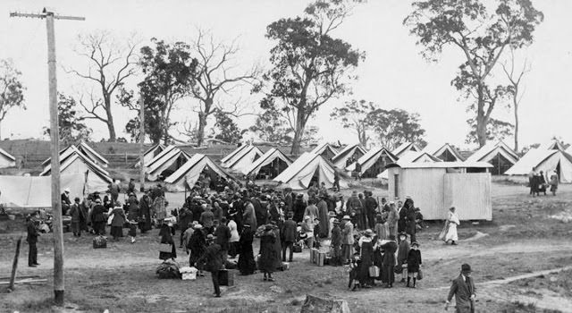 People arrive at a quarantine camp in Wallangarra, Australia, during the influenza epidemic of 1919.