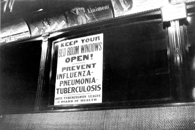 A health warning about influenza from the Anti-Tuberculosis League, posted on the inside of a public transport vehicle.