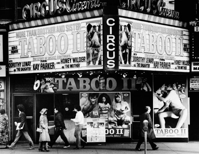 The Circus Cinema in Times Square, showing 'Taboo II', an incest-themed adult film, New York City, 1983.