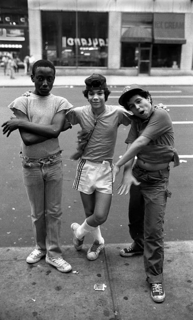 Three boy prostitutes pose for the camera while waiting for customers.