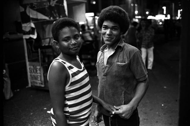 Two young hustlers in Times Square.