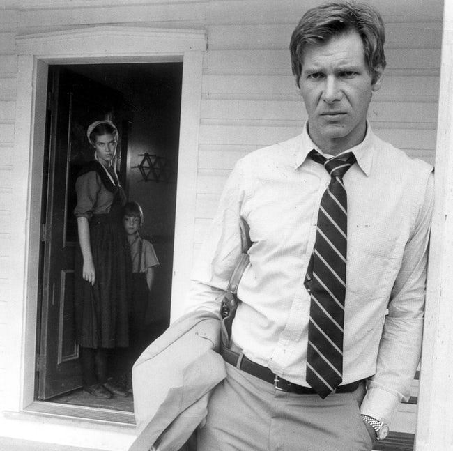 Young Harrison Ford Standing with Hand in Pocket
