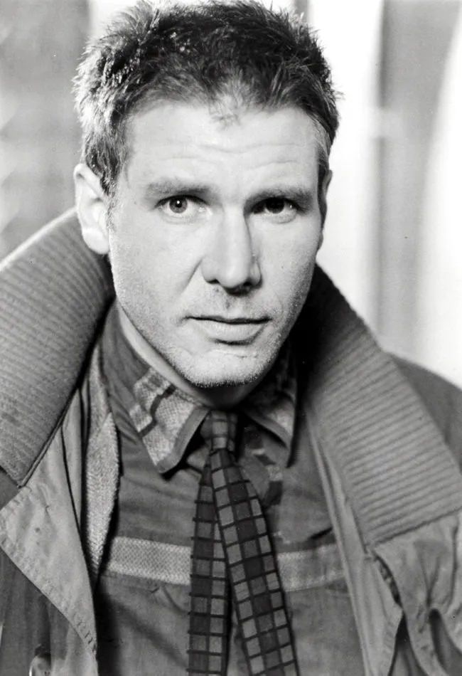Young Harrison Ford in Gray Coat