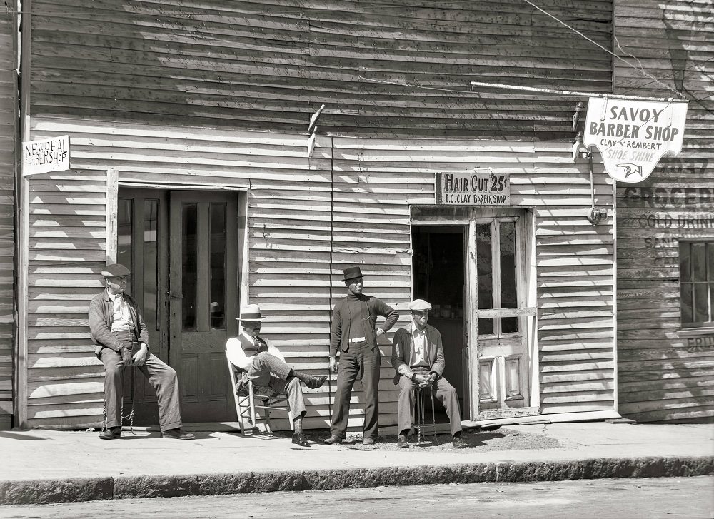 Vicksburg Negroes and shop front, Vicksburg, Mississippi, March 1936