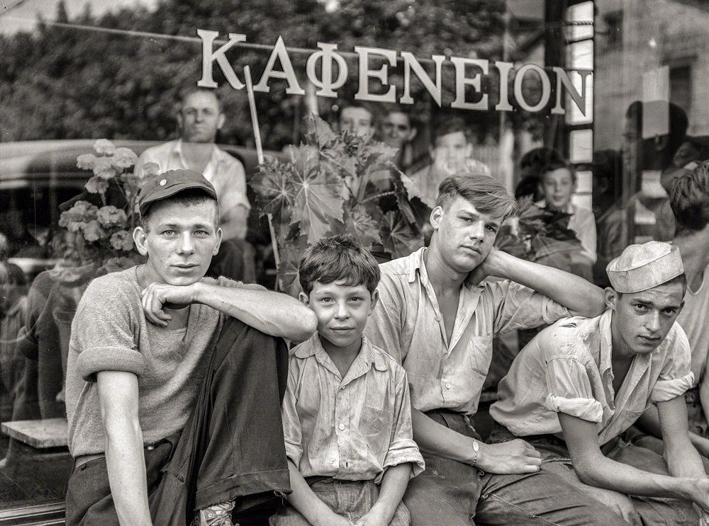 Boys in the town in front of Greek coffee shop. Ambridge, Pennsyl­vania, July 1938
