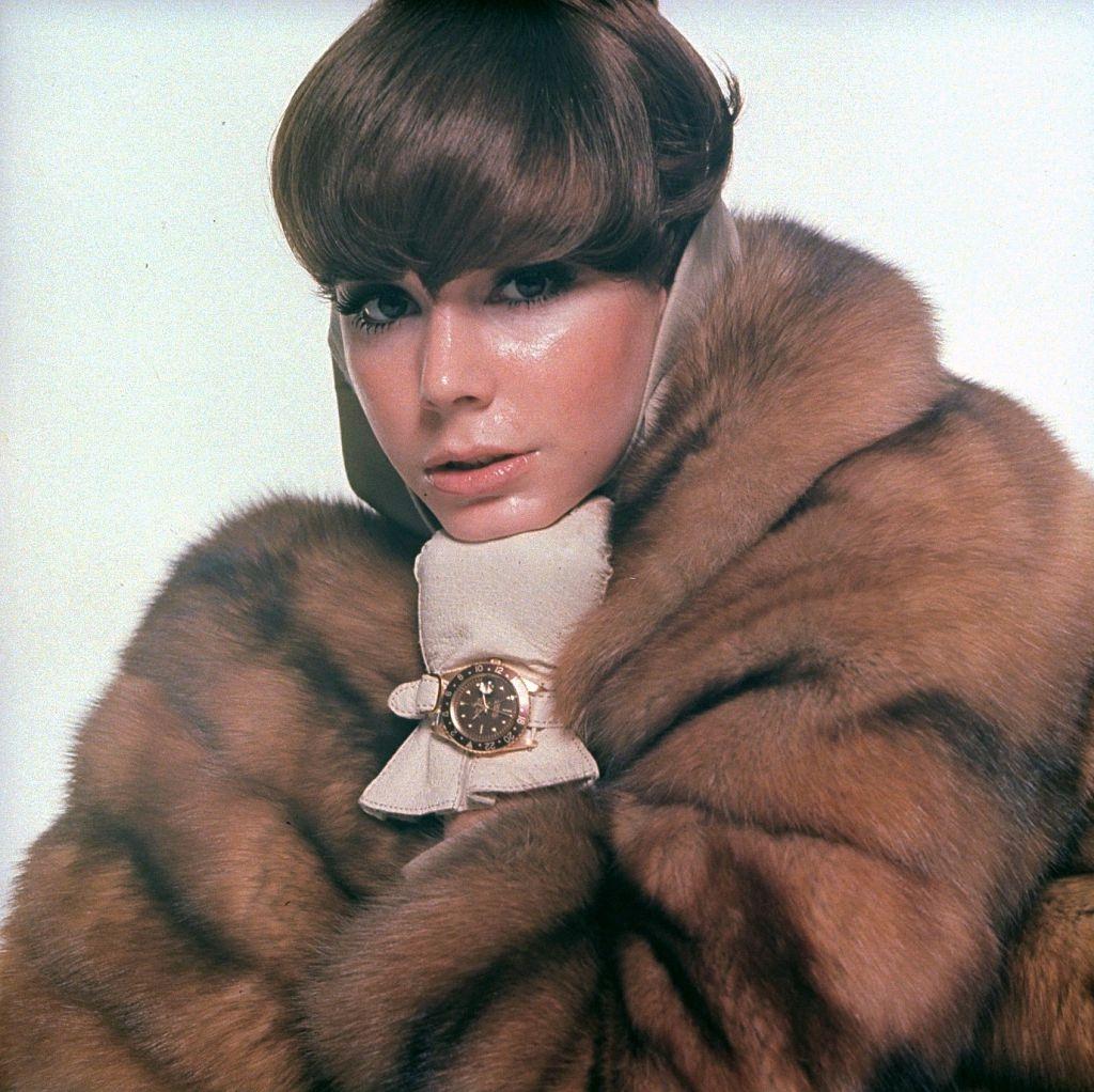 Fashion model in natural golden Russian sable coat, Vogue 1966