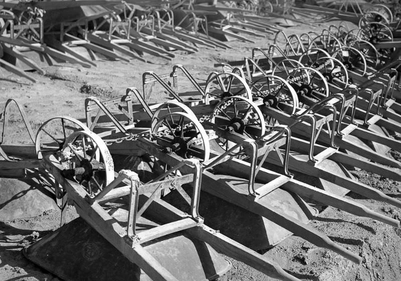 Wheelbarrows used in depression-era government work programs sit idle, February 1939