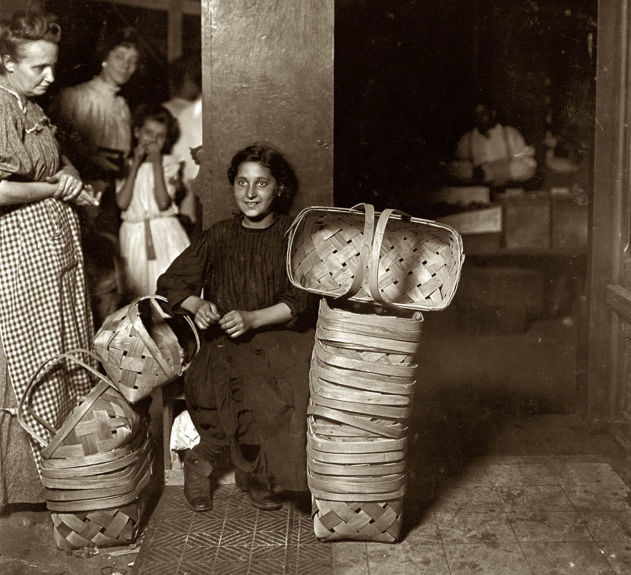 Lena Lochiavo, 11 years old, Basket Seller, Sixth Street Market, Cincinnati, August 1908