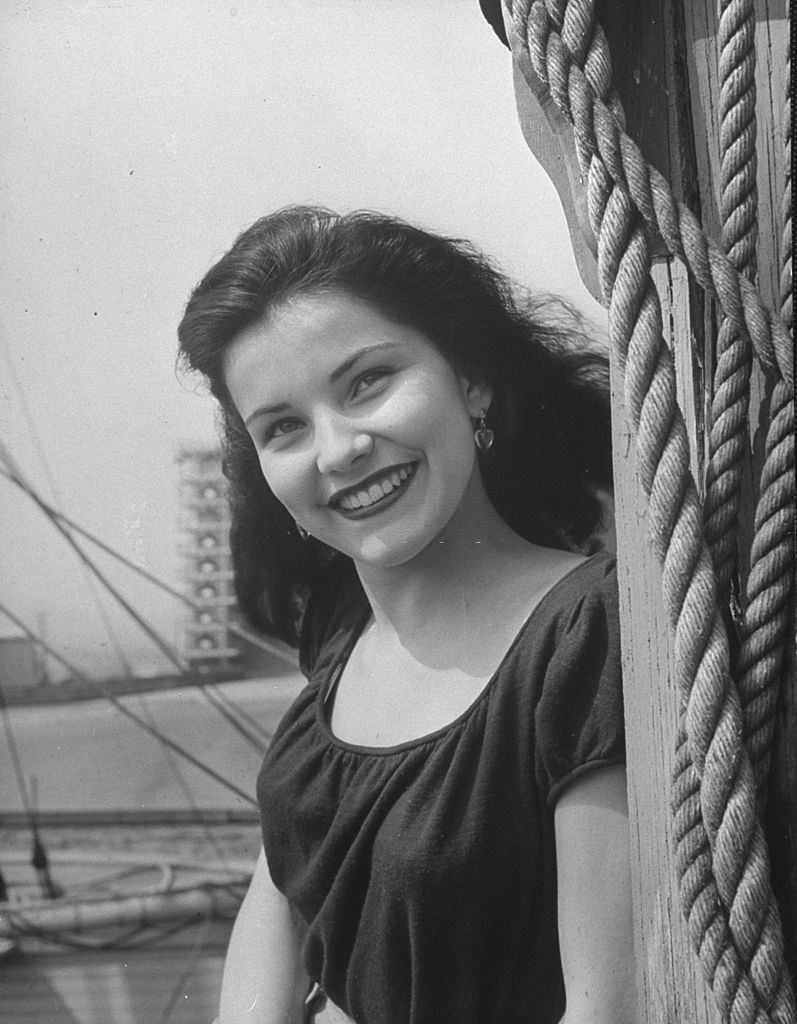 Debra Paget, smiling.