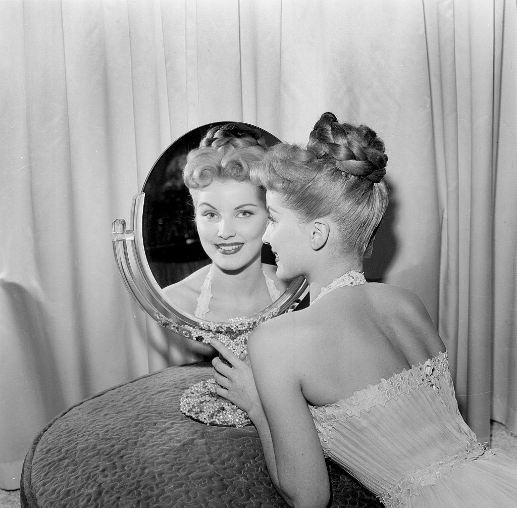Debra Paget poses in Los Angeles, 1957
