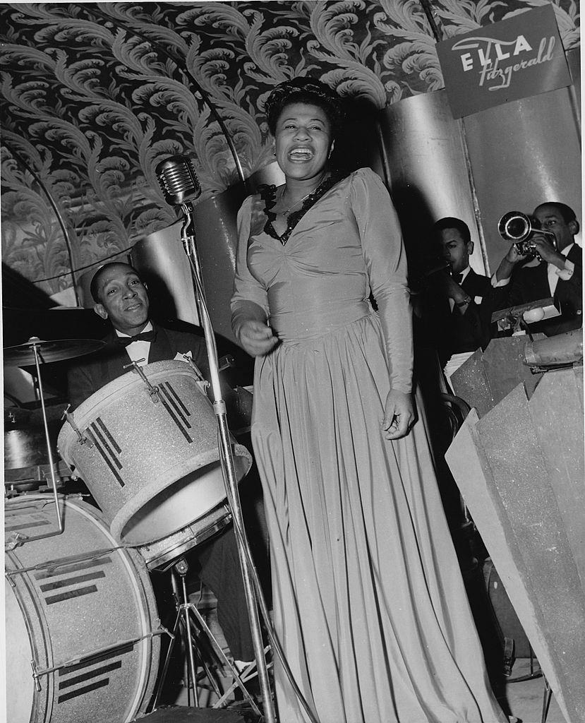 Ella Fitzgerald performing on stage at the Savoy Ballroom in 1940