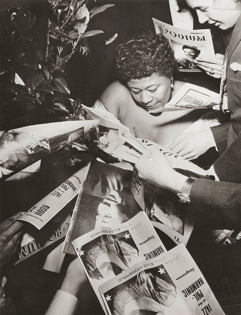 Ella Fitzgerald signing autographs on the occasion of her gig at the concert series Jazz at the Philharmonic, Vienna, 1954
