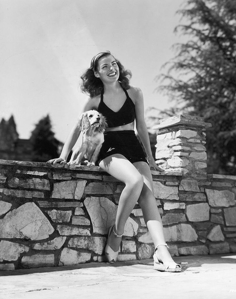 Ella Raines with her pet cocker spaniel Poochie, circa 1945