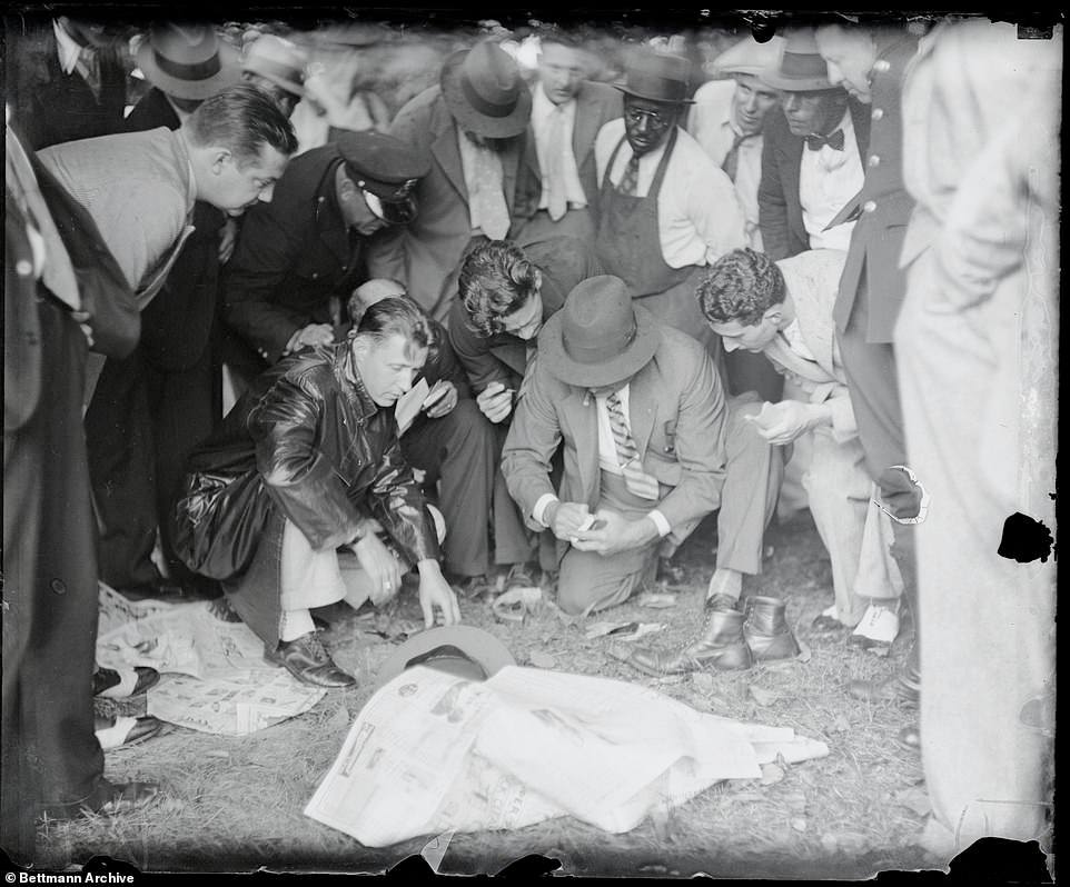 Long Island man Thomas N.Innes was found bound and gagged at the bottom of the tidal basin. Investigating officers sift through his belongings without gloves as curious spectators peer over them