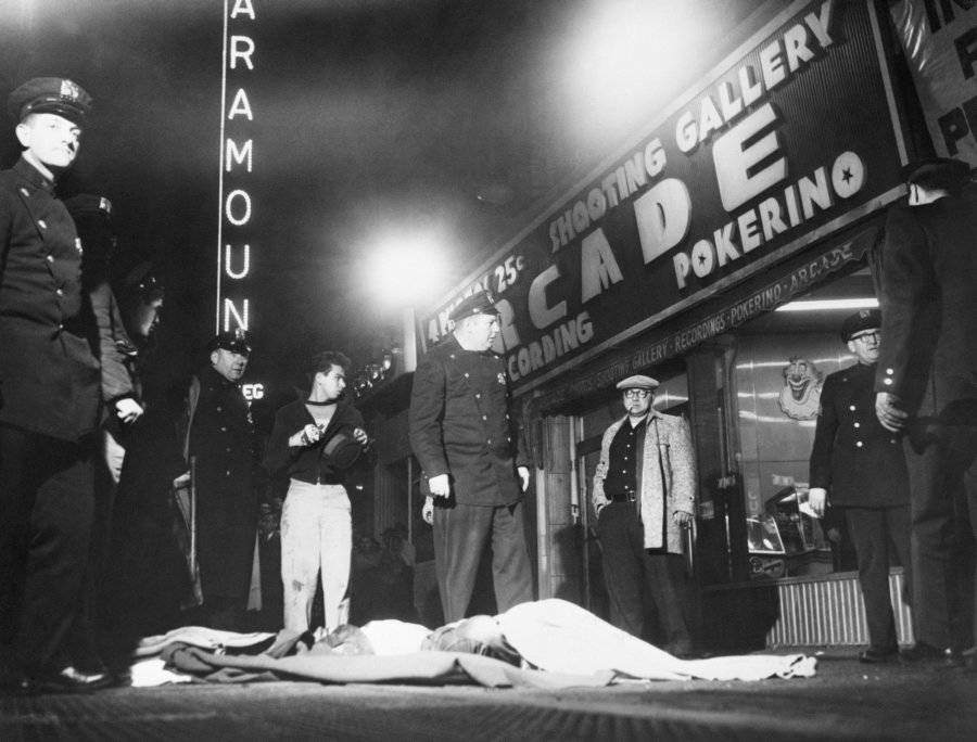 Murder scene outside an "amusement arcade" in downtown Brooklyn. 1959.