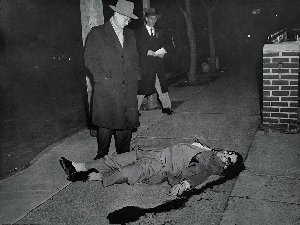 The body of Arnold Schuster, 24, - a Brooklyn pants salesman - who had tipped off police on the whereabouts of American robber Willie Sutton after spotting him on a subway train following the criminal's daring jail escape, 1952