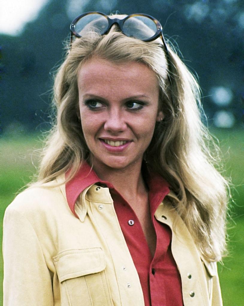 Hayley Mills wearing a red blouse beneath a yellow jacket, 1965