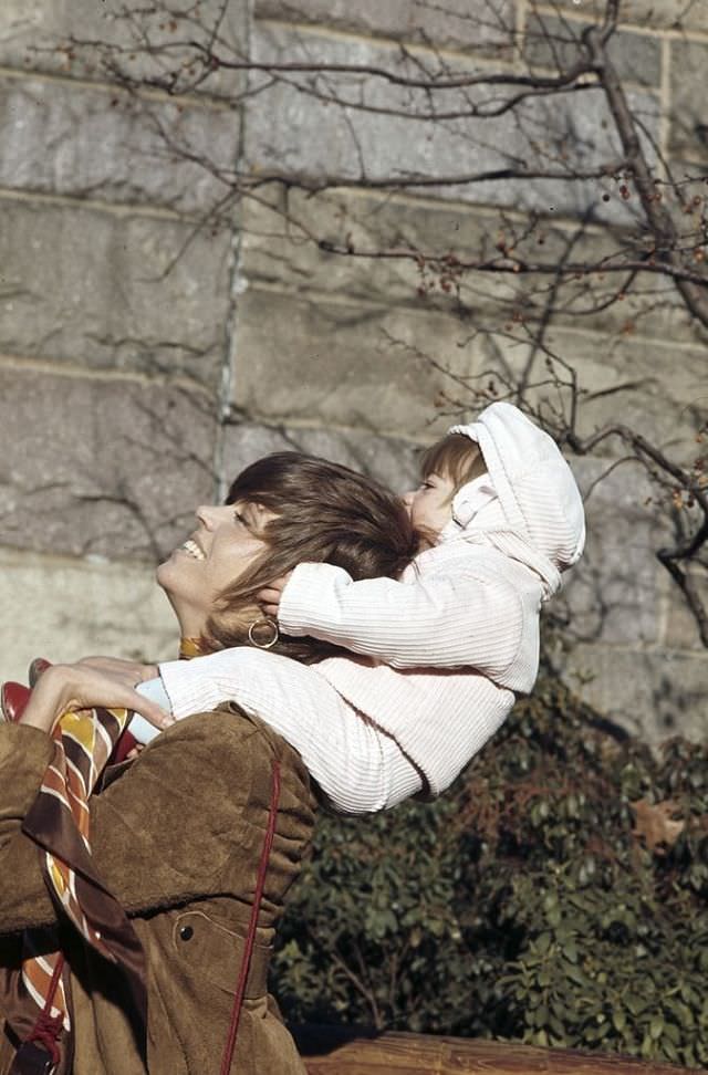 Jane Fonda playing with her daughter