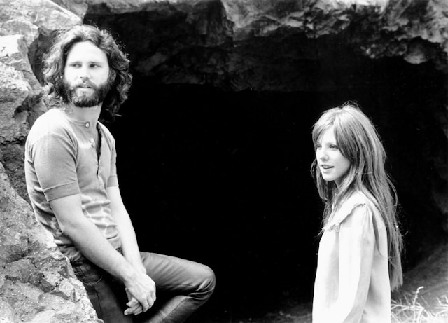 Jim Morrison and Pamela Courson in a cave, 1969