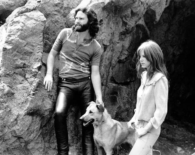 amela Courson and Jim Morrison with a dog, 1969