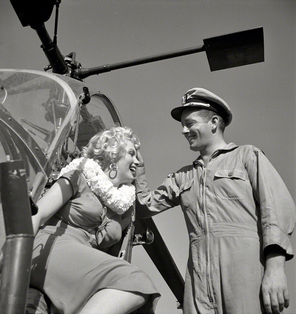Marilyn Monroe with a Navy pilot for the Look magazine assignment "Helicopter View of L.A, 1952