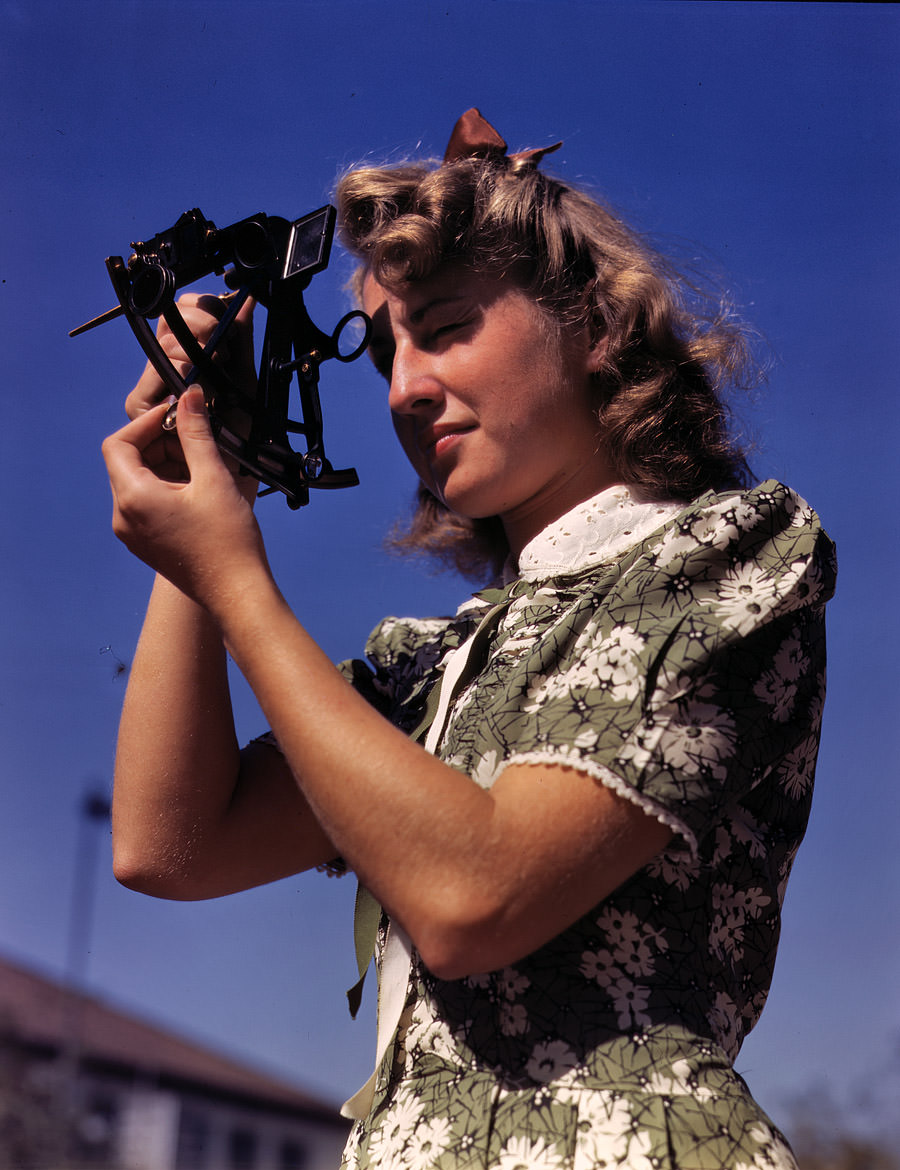 Learning how to determine latitude by using a sextant is Senta Osoling, student at Polytechnic High School, Los Angeles, September 1942