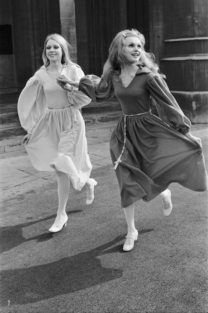 Madeline Smith wearing a countdown dress with another model, 1969