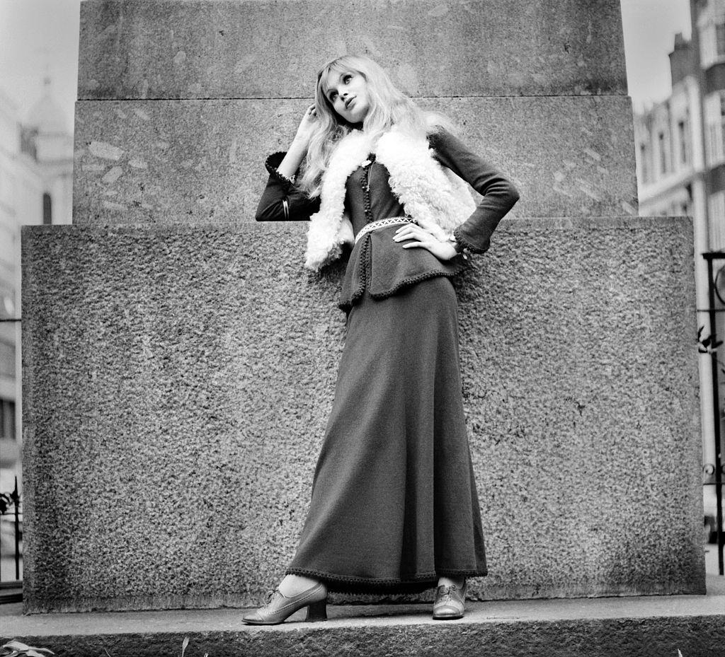 Madeline Smith n London wearing a black dress, 1969