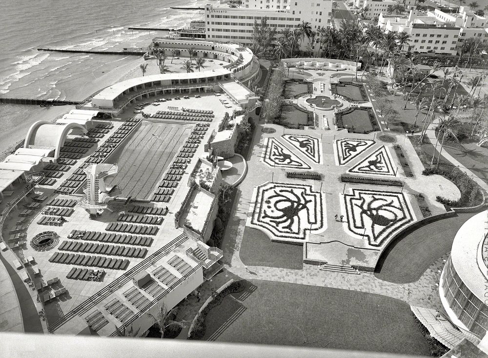 Fontainebleau Hotel, Miami Beach, Roof view of pool, cabanas and garden, 1955