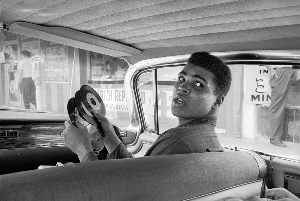 Muhammad Ali in his Cadillac, Miami, 1960