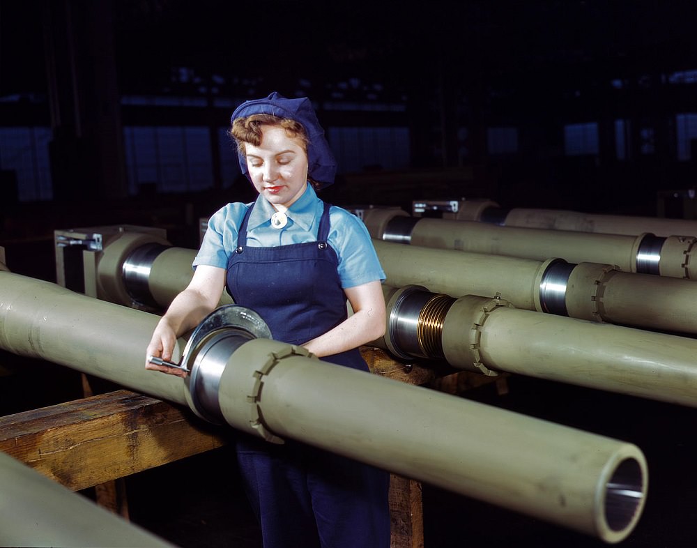 Mrs. Mary Betchner measuring 105mm howitzers at the Milwaukee, Wisconsin, February 1943