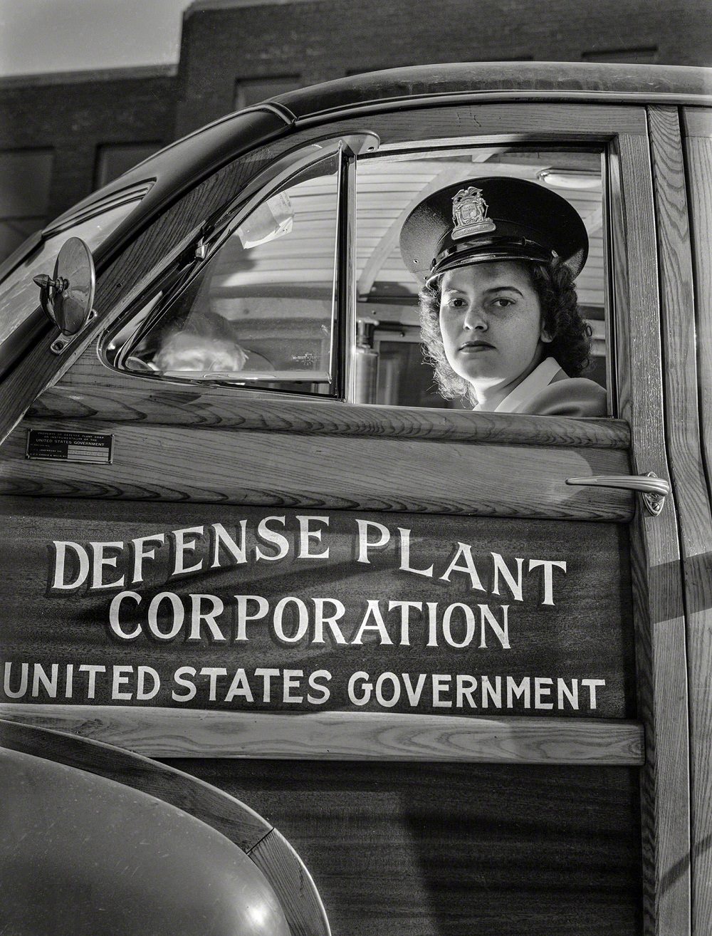 Jewell Halliday, her job is shuttling workers between two Midwest war plants for Allis-Chalmers Manufacturing Co, Milwaukee, 1942