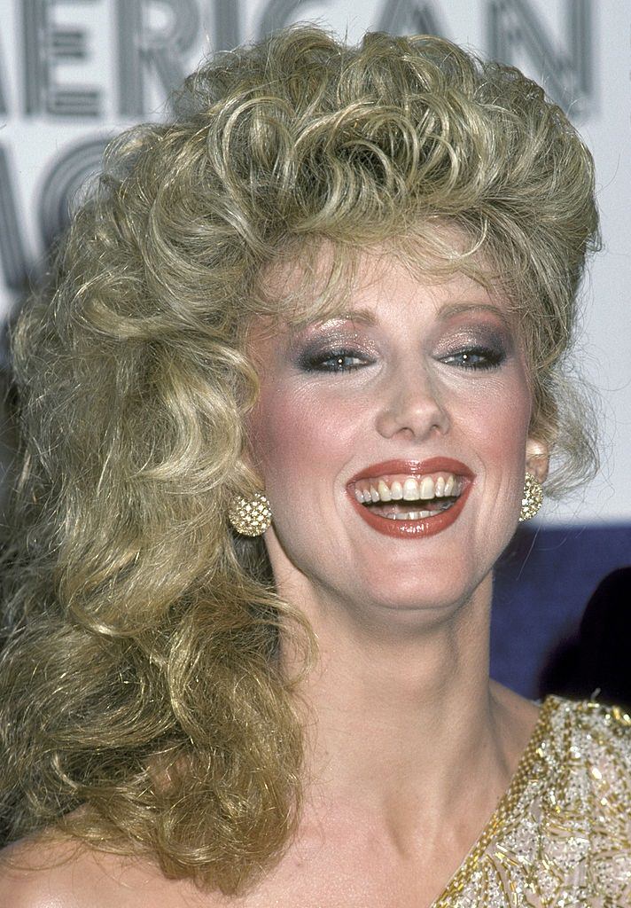 Actress Morgan Fairchild poses backstage during the 54th Academy Awards at Dorothy Chandler Pavilion in Los Angeles, 1982